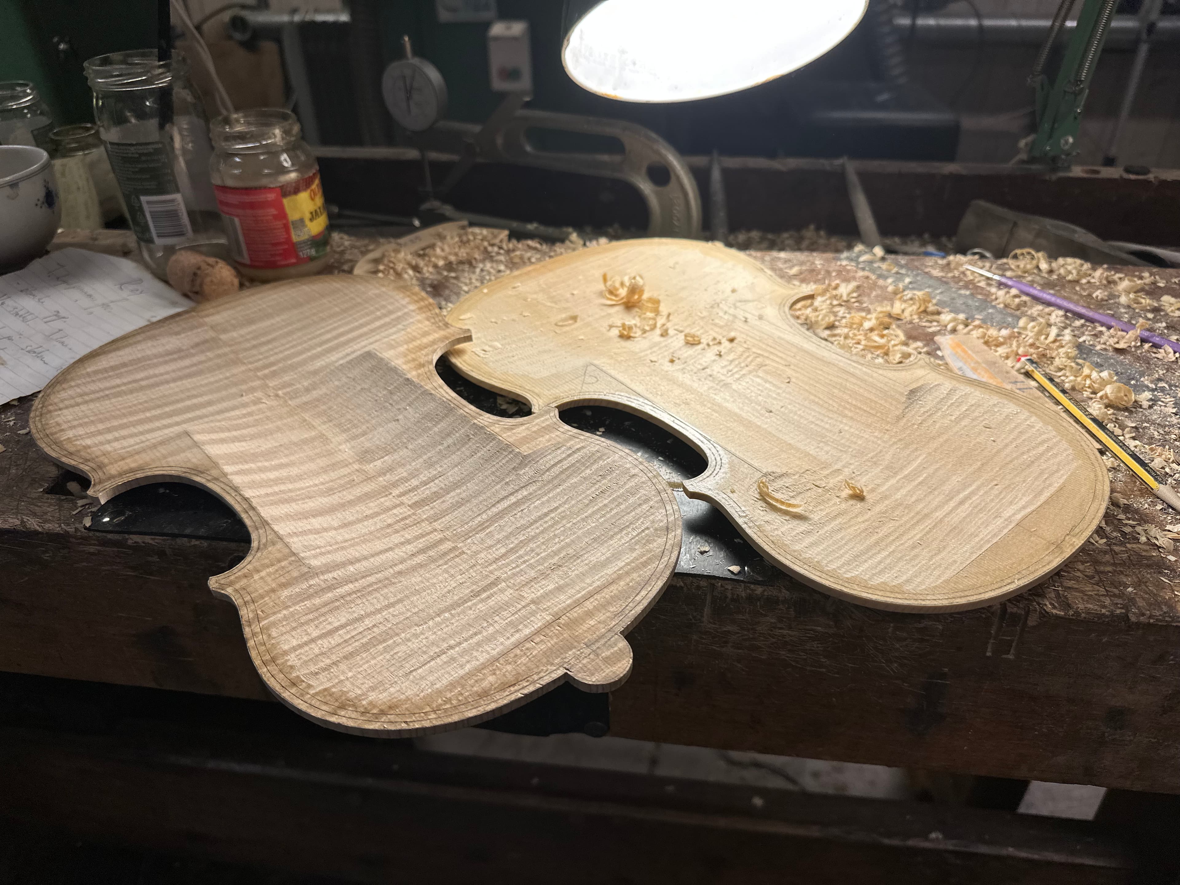 Hand-carving the violin plates with a finger plane
